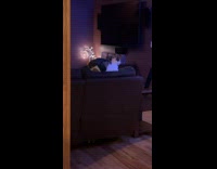 Zoom in to cat sit on sofa