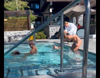 Collab IITW - Man Assists Afloat Lady Circle Around Pool