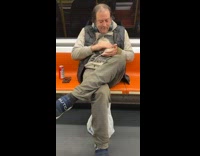 Man Checks Out Pet Rat and Leaves on his Belly