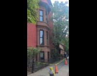 Collab WINY - Man removing hanging roof eave