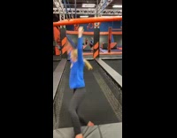 Indoor trampoline park blue shirt orange socks