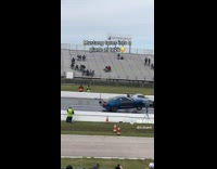 Light Car Leans Back on Drag Race