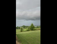 Loud thunder day time grey clouds house