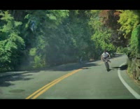 Guy rides e-bike almost hit by car