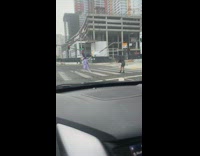 Guy suit wave yellow flag staples center