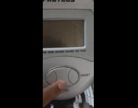 Guy presses button small chirp low battery