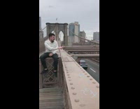 Black jacket girl guy picks nose bridge 