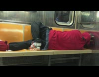 Man red jacket humps seat and masturbates on subway train