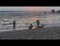 Man does push ups on beach video
