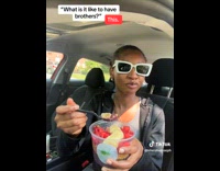 Man Grabs Fruit Bowl and Spoon from Lady