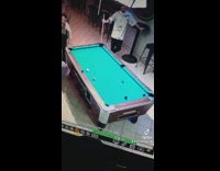 Woman wins billards pool game 