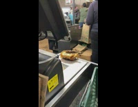 Fried chicken piece on barcode scan at cashier checkout line