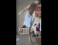 Guy doing jumping dance slips and falls on face