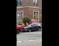 Flat tires car full of traffic cones