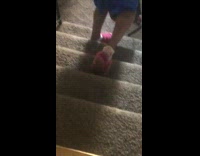 Guy falls while showing off slippers 