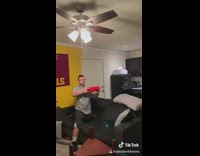 Nerf gun fight in living room