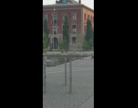 2 ladies dance in water on campus