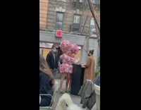 Ladies wear matching dresses made from flowers 