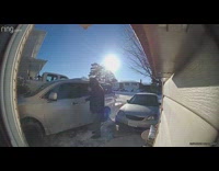 Ring security cam footage of a icicle that falls on a mans head 