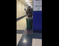 selfie with green recycling bin