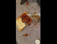 Woman films her spilled wingstop on floor