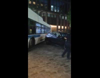 MTA bus hit black car on street