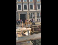 Three women on boat for video shoot