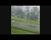 Hurricane strong winds rain destroyed roof aftermath