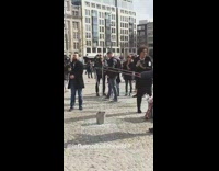 Lady walks through bubbles rolling backpack trips 