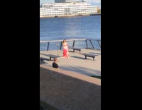 White floral dress lady phone tripod ocean