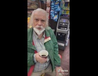 Guy puts coins in coffee cup homeless 