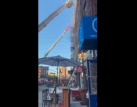 Firefighters responding to fire breaking out next door 