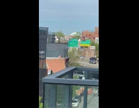 Woman black bikini sexy dance video shoot rooftop