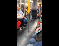 Guy performs inside subway hangs and headstand