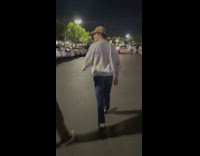 Guy shoots boba on friends back