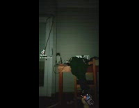 White cat lifts head glowing eyes