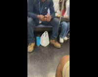 Guy wearing zebra pants plays the flute