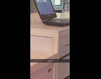 Man takes out portable DVD player at TMobile store and has porn tape playing