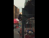 Brown hat guy climbs up train platform 