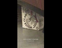 Empty case of White Claw Hard Seltzer left on the floor on train