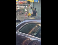 Men fight hits each other on street