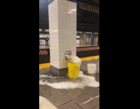 Collab WINY - Soapy water overflow from yellow bucket subway