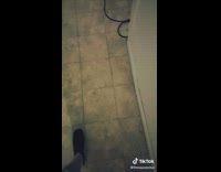 Guy lifts blue shirt up shows stomach