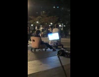 Men plays console on wheels at park Part 1