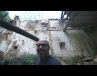 Man shows and plans to rebuild house ruins
