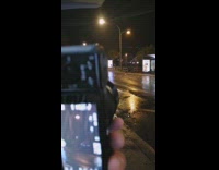 Person photograph bus stop poster and lightning