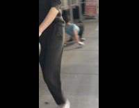 Guy crab walks on sidewalk 