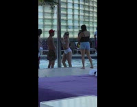 Girl white tube bikini lean pole pool