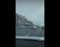 White Lamborghini speeds on freeway and crashes