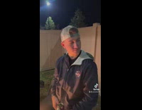 Guy stops talking when he hears car drive by 